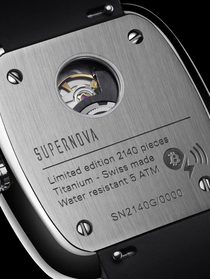 The SN 2140 caseback, the rotor visible through its sapphire window